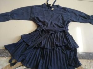 Embroidered Peplum Top