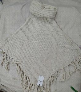 Elegant Knitted Poncho with Fringe