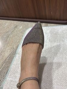 shiny pair of stelletoes
