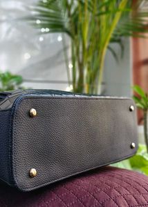 Elegant Black Woven Handbag