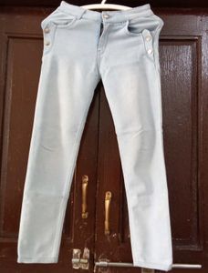 Light Wash Jeans with Button Detail