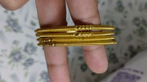 golden bangles with ghungroo