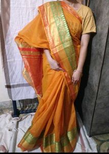 Vibrant Orange Saree with Green Border