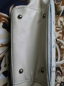 Chic Striped Handbag with Floral Embroidery
