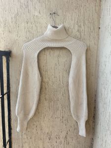 Cream Ribbed Turtleneck Sweater Arms