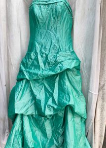 232112. Stunning Teal Tiered Gown