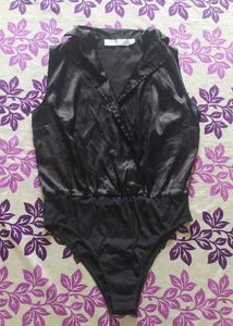 blacksatinbodysuit with a collared, wrap-style Top