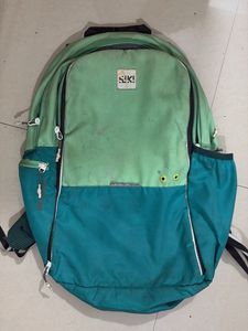 Green and Teal Backpack used need a wash