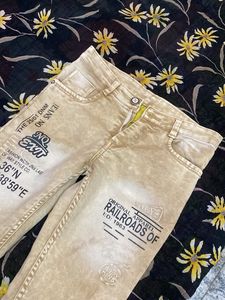 Stylish Beige Jeans with Graphic Print