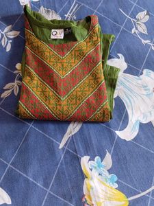 Elegant Green Kurta with Embellished Neckline