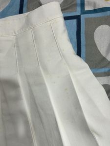white mini pleated skirt