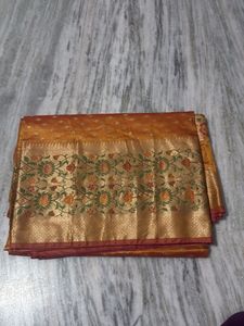 Beautifully Woven Orange Silk Saree