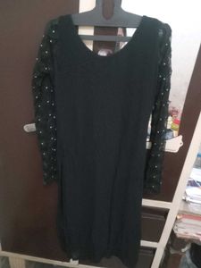 Chic Black Dress with Embellished Sleeves