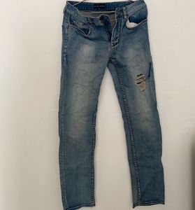Distressed Blue Jeans