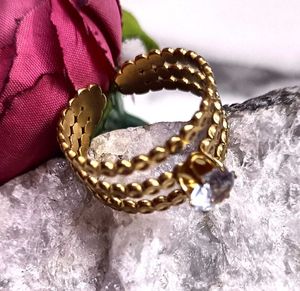 Elegant Gold Ring with Crystal