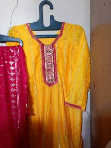 yellow and pink heavy sharara suit with