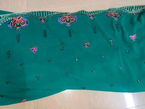 Elegant Teal Saree with Gold Border