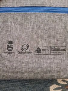 Gray zippered pouch with strap