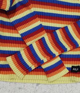 Rainbow Striped Cropped Turtleneck Sweater.