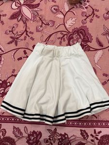 White Pleated Skirt with Black Stripes