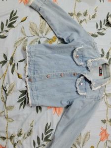 Denim Jacket with Frayed Edges
