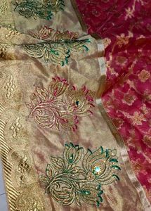 Reddish pink party wear organza tissue silk saree