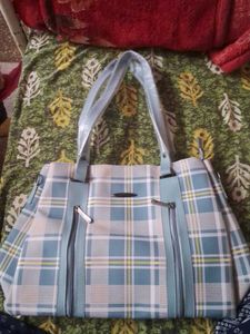 blue and white checked handbag