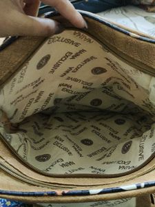 Brown Backpack with 3 chains ⛓️ space