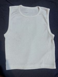 white sleeveless tank top with classic round (crew