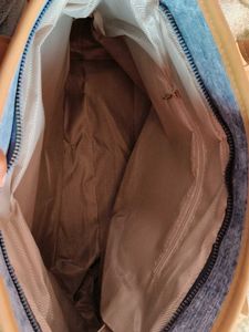 Stylish Denim Handbag with Leather Accents