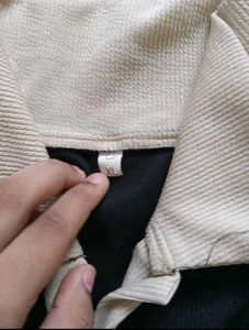 classic beige-black collar top
