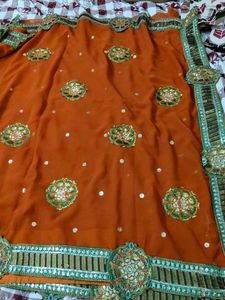 beautiful rust saree perfect for occasions