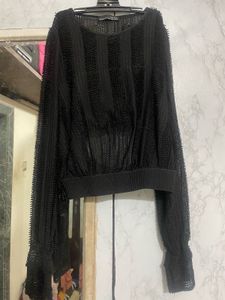 Zara black netted blouse with a bask lining