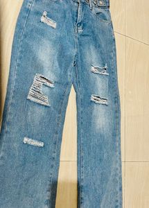 Distressed Blue Denim Jeans