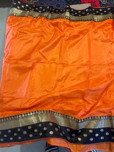 Elegant Orange Saree with Black &amp; Gold Border