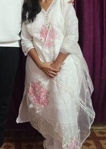 a beautiful white kurta set