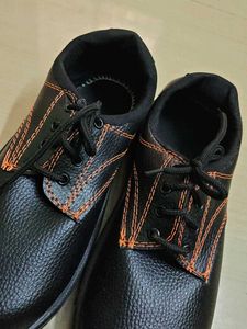 Black Shoe with Orange Stitching