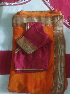 Orange Saree with Floral Motifs