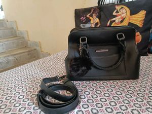 Stylish Black Handbag with Fur Pom-Pom