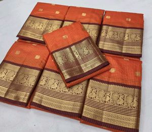 Elegant Orange Saree with Peacock Border