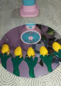 Cute tulip flower mirror art with pista shells