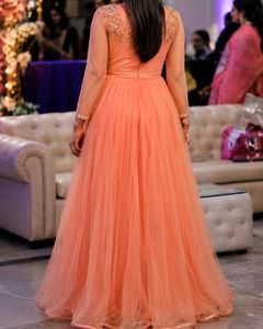 Stunning Orange Net Gown with Embellished Belt