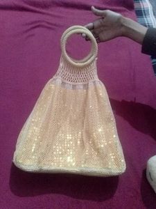 Golden Sequence Pottly Beg👝