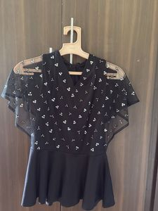 Black Peplum Top with Sheer Overlay