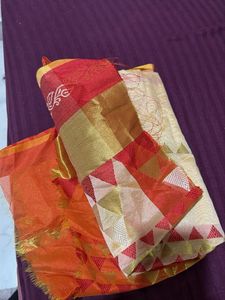 Vibrant Orange Saree with Golden Accents