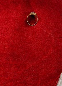 Elegant Gold Ring with Gemstone Accent
