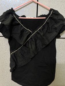 Chic Black Ruffled Top with Pearl Detail