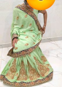 heavy party wear saree Light Green Embellished