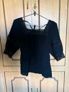 Elegant Black Top with Lace Detail