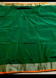 Dark green pure silk saree